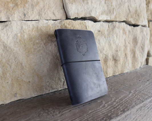 navy blue field notes journal debossed with naval academy logo