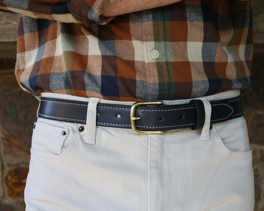 Navy blue belt that is debossed with the Naval Academy n-star logo